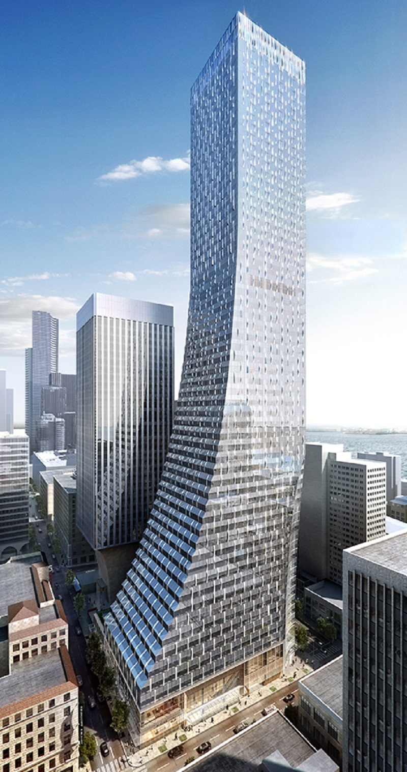 A tall, modern skyscraper with a distinctive curved twist rises above city buildings under a clear sky; its glass facade reflects sunlight and the surrounding urban landscape.